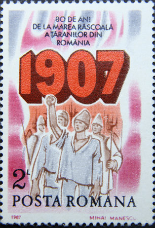 ISTANBUL, TURKEY - APRIL 17, 2021: Romanian stamp shows Peasant Uprising of 1907, 80th Anniversary circa 1987のeditorial素材