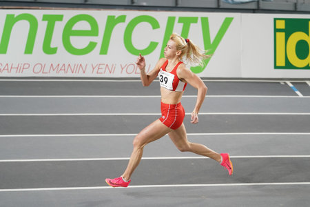 ISTANBUL, TURKIYE - FEBRUARY 10, 2024: Undefined athlete running during Balkan Athletics...