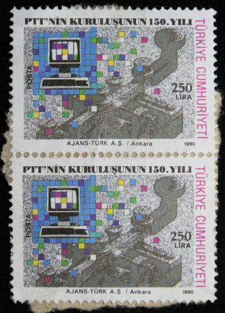 ISTANBUL, TURKEY - DECEMBER 26, 2020: Turkish stamp shows PTT, 150th Anniversary, Telegraph key,...