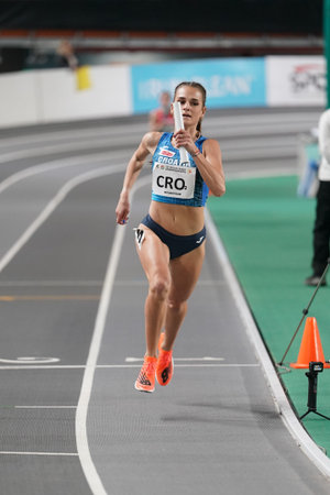 ISTANBUL, TURKIYE - FEBRUARY 10, 2024: Undefined athlete running 4x400 metres relay during Balkan...