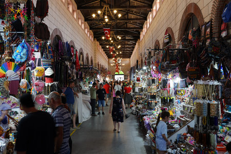 CANAKKALE, TURKIYE - JUNE 19, 2024: People shopping in Aynali Carsi Bazaar