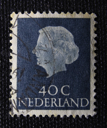 ISTANBUL, TURKEY - JANUARY 01, 2021: Holland stamp shows Queen Juliana circa 1953のeditorial素材