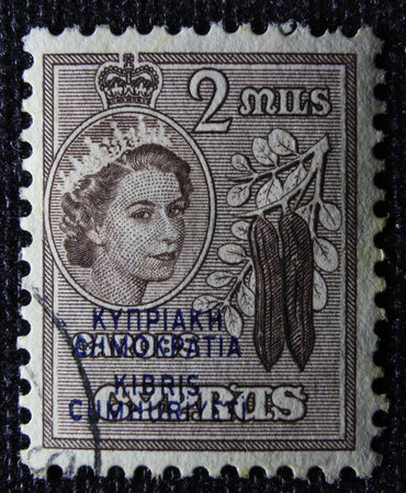 ISTANBUL, TURKEY - JANUARY 01, 2021: Cyprus stamp shows Carobs circa 1953のeditorial素材