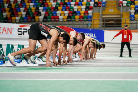 ISTANBUL, TURKIYE - FEBRUARY 22, 2025: Athletes running 60 metres during Turkish Indoor Athletics Championships in Atakoy Athletics Arenaのeditorial素材