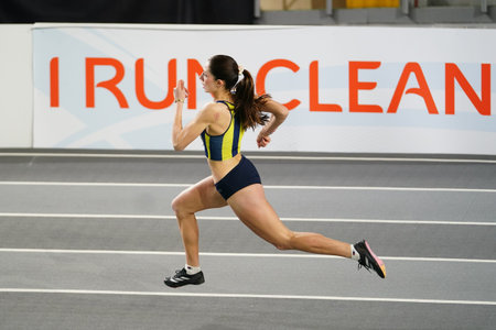 ISTANBUL, TURKIYE - FEBRUARY 22, 2025: Undefined athlete running during Turkish Indoor Athletics Championships in Atakoy Athletics Arenaのeditorial素材