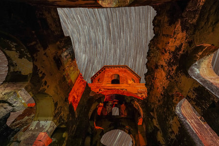 Star Trails over Red Church in Cappadocia, Nevsehir City, Turkiyeの写真素材