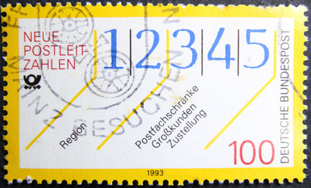 ISTANBUL, TURKEY - JANUARY 24, 2021: German stamp shows New Postal Codes circa 1993のeditorial素材