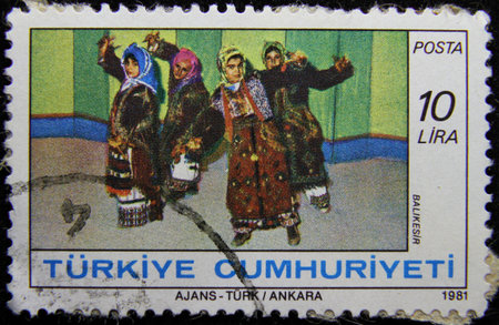 ISTANBUL, TURKEY - DECEMBER 27, 2020: Turkish stamp shows Turkish Folk Dance,  Balikesir circa 1981のeditorial素材