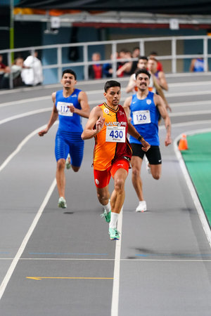 ISTANBUL, TURKIYE - JANUARY 07, 2026: Athletes running during Turkish Athletic Federation Olympic Threshold Competitions in Atakoy Athletics Arenaのeditorial素材