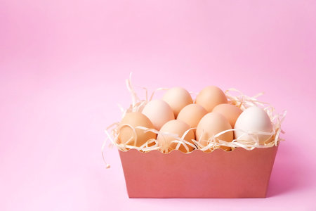 Beautiful easter table composition. Unpainted quail & chicken eggs w/ decorative hay in the box & on...