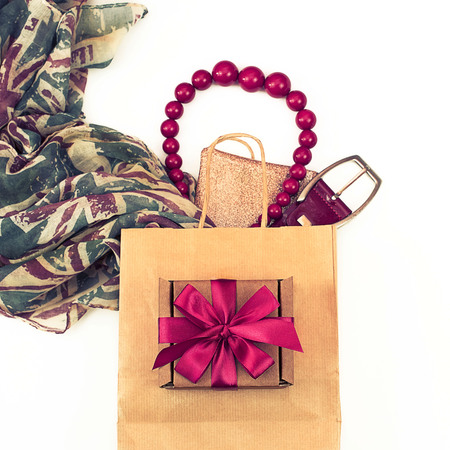 Frame from elements of the female wardrobe. Blank white background for text. The image of the modern woman shoppingの写真素材