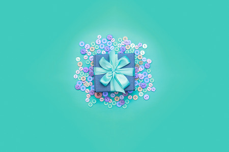 Decorative gift box with a colored background. Top view Flat Layの写真素材