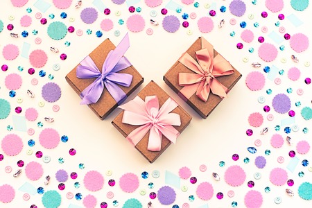 Gift box on festive pastel background. Flat lay top viewの写真素材