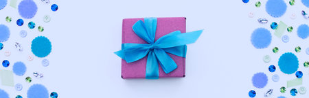 Banner Gift box on festive pastel background. Flat lay top viewの写真素材