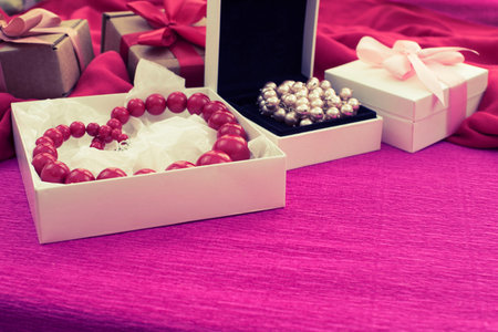 Decorative composition preparation for the holiday Decoration gifts. Purchase a Set of women's jewelry. Blurred backgroundの写真素材