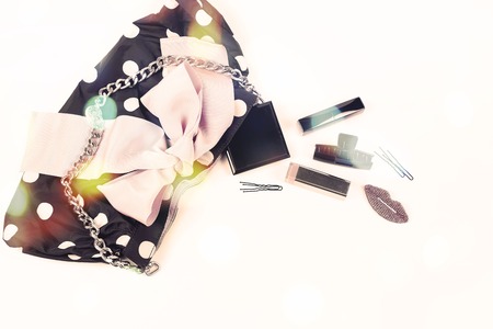 Poster women's handbag with decorative cosmetics. Top view Flat layの写真素材