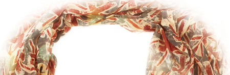 Banner Decorative draping frame of the textile. Women's scarf red figure the British flag. White background top viewの写真素材