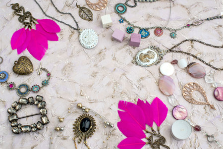 Great set of jewelry for women. Beautiful necklaces, earrings with feathers.
