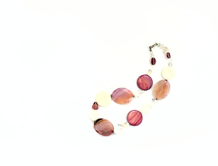 Decoration on the neck for a young woman. White backgroundの写真素材