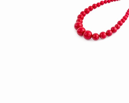 Fashionable jewelry for women on a white background. Necklace red.の写真素材