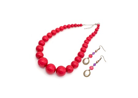 Fashionable jewelry for women on a white background. Necklace red.の写真素材