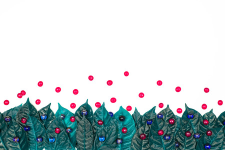 Surrealism Natural festive green leaves background on white background.の写真素材