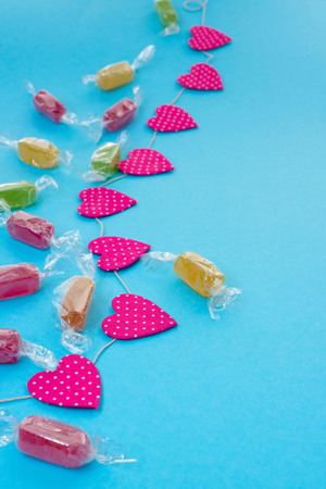 Festive background with Bright garlands of Candy Confetti.の写真素材