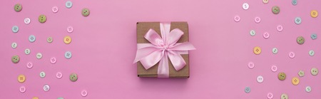Banner Decorative holiday gift boxes with pink color on pink background. Flat flat top viewの写真素材