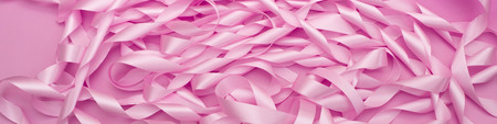 Banner delicate texture of satin ribbons of pink color. Textured background Flat lay top Viewの写真素材