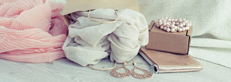Banner A set of women's Fashion accessories shopping Jewelry Scarf. Wooden background with place for...