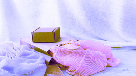 Surrealism A set of women's Fashion accessories shopping Jewelry Scarf. Wooden background with place for textの写真素材