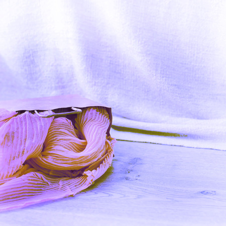 Surrealism A set of women's Fashion accessories shopping Jewelry Scarf. Wooden background with place for textの写真素材