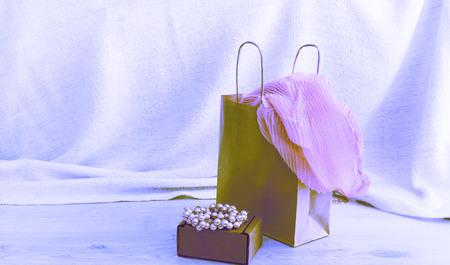 Banner Surrealism A set of women's Fashion accessories shopping Jewelry Scarf. Wooden background with place for textの写真素材