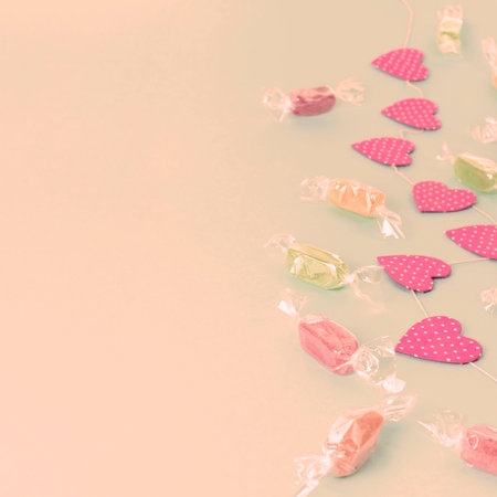 Festive background with Bright garlands of Candy Confetti. Top view Flat Lay