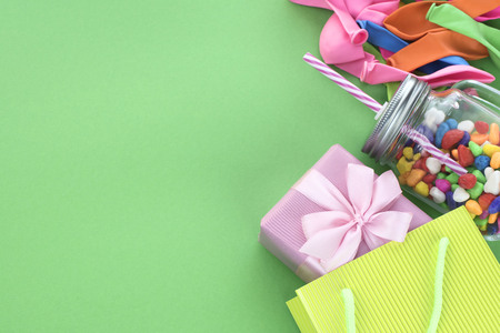 Festive composition set of gift boxes with balls candy cocktail materials scissors . Top view copy space for your flat lay textの写真素材