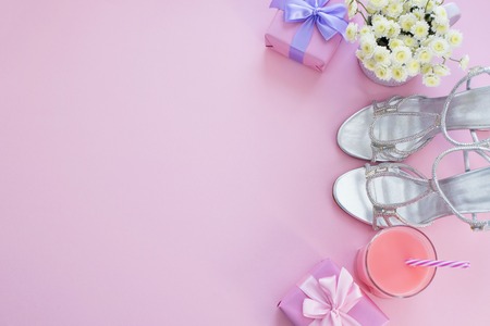 Gift box with satin ribbon bow for women Flowers Buy Shoes a Glass of Cocktail.の写真素材