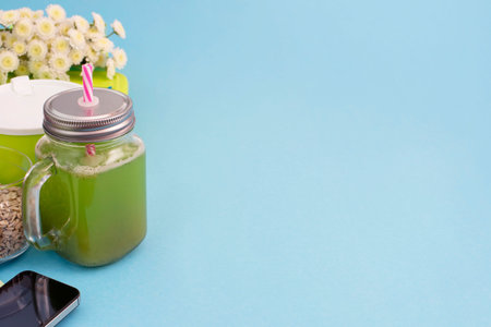 Glass mug with a tube with fresh smoothies.の写真素材