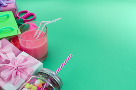 Festive composition set of gift boxes with balls candy cocktail materials. Top view copy space for your flat lay textの写真素材