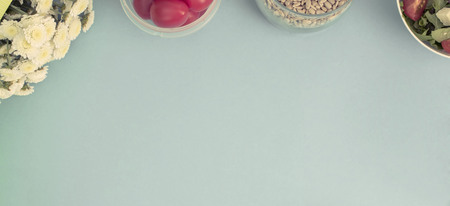 Banner set of useful products, cherry Tomato, apple fruit Seeds Plastic Tableware White Flowers Fresh Salad top View Copy Space for Text Flat Layの写真素材