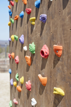 Wooden wall for climbing close up. Sports extreme multicolored backgroundの写真素材