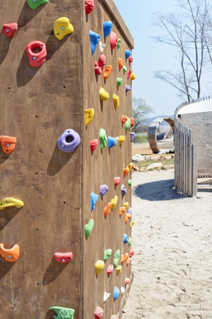 Wooden wall for climbing close up. Sports extreme multicolored backgroundの写真素材