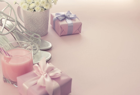 Gift box with satin ribbon bow for women Flowers Buy Shoes a Glass of Cocktail.の写真素材