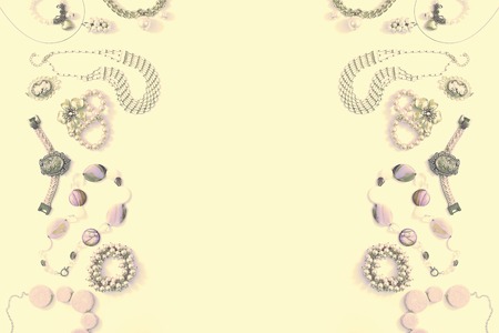 Surrealism Set of women's jewelry in vintage style necklace cameo pearl bracelet chain earrings on white background. The view from the top lay flat.の写真素材