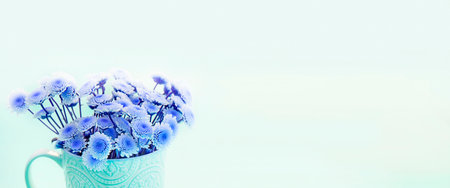 Banner Surrealism bouquet of chrysanthemums on a light background. Top view copy space flat lay