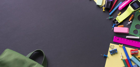 Banner Concept back to school apple backpack stationery on black background.の写真素材