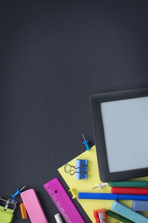 Concept back to school watch chalk line cookies stationery on black background. Top view Flat layの写真素材