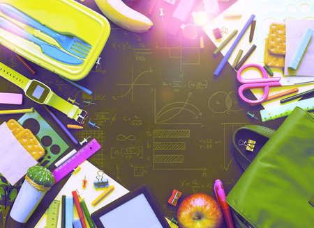 Surrealism Concept back to school apple backpack stationery on black background. Top view Flat layの写真素材