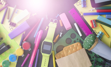 Concept back to school watch chalk line cookies stationery on black background. Top view Flat layの写真素材