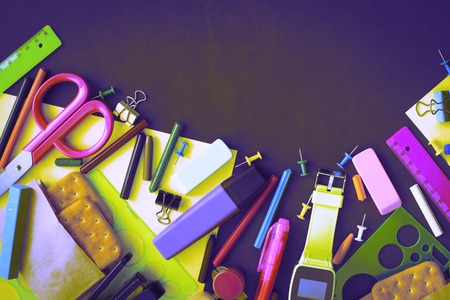 Surrealism Concept back to school watch chalk line cookies stationery on black background. Top view...