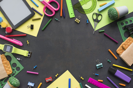 Concept back to school watch chalk line cookies stationery on black background. Top view Flat layの写真素材